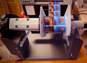 Afinia Label L801 paired with the optional rewinder for roll to roll printing