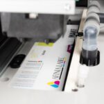 Afinia Label X350 Inkjet label press under printhead print zone