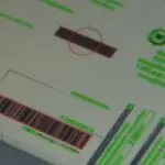Inspection of printed label with defects and correct elements highlighted